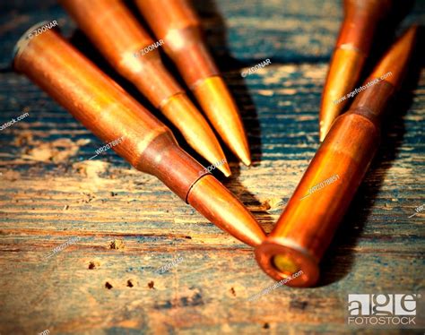Still life with five rifle cartridges, Stock Photo, Picture And Royalty Free Image. Pic ...