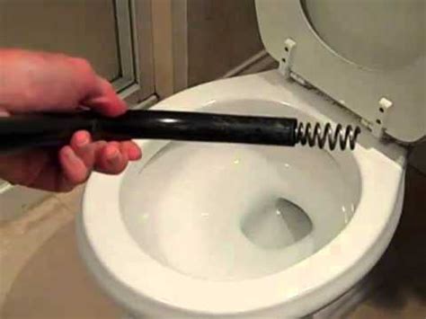 How to Snake a Toilet: Clear a Toilet Clog - So Easy! - YouTube