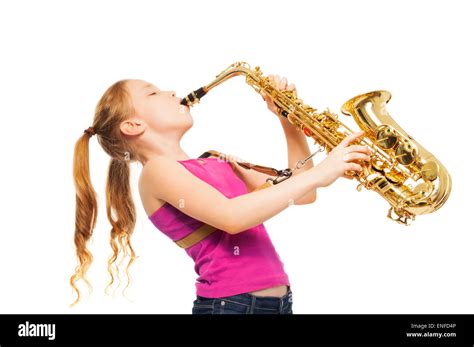 Happy girl playing saxophone on white background Stock Photo - Alamy