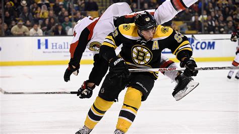 Video: Brad Marchand low hit on Mark Borowiecki flips defenseman ...