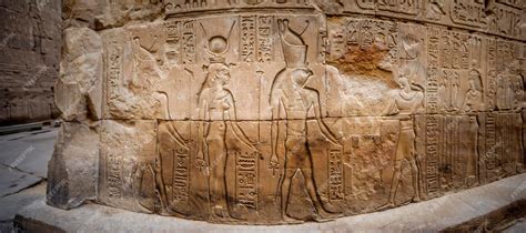 Premium Photo | Ancient egyptian hieroglyphs and relief drawings on one of the walls of the edfu ...