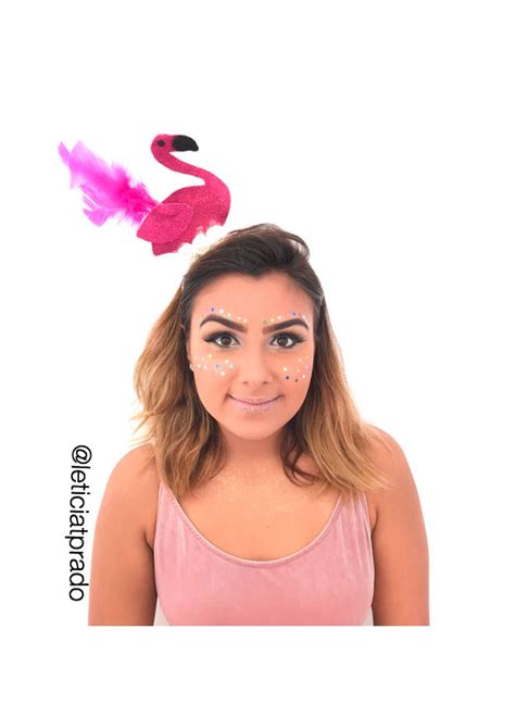 a woman with makeup on her face and a pink flamingo behind her head