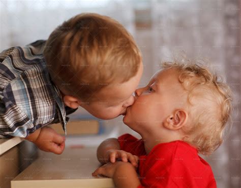 Little Brothers Kissing - Stock Photos | Motion Array