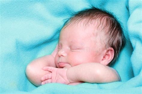 Sleeping Newborn Baby Boy stock image. Image of hand - 23685977