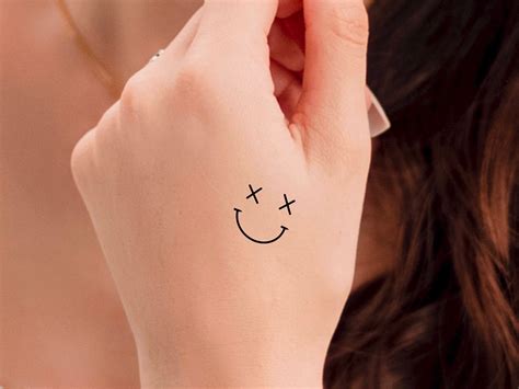 Cross Eyed Smiley Face Tattoo: A Simple Guide to Get One and Make ...