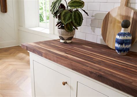 Upgrade Your Kitchen with Stunning White Cabinets and Walnut Countertops: A Perfect Blend of ...