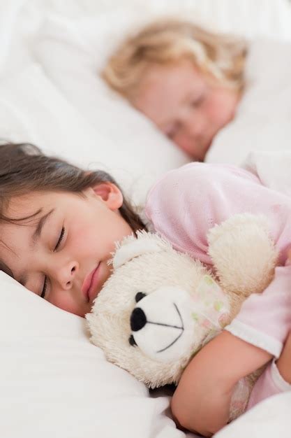 Premium Photo | Portrait of calm children sleeping