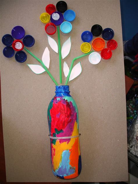 RECICLAMOS TAPONES Y BOTELLAS | Spring crafts for kids, Water bottle ...