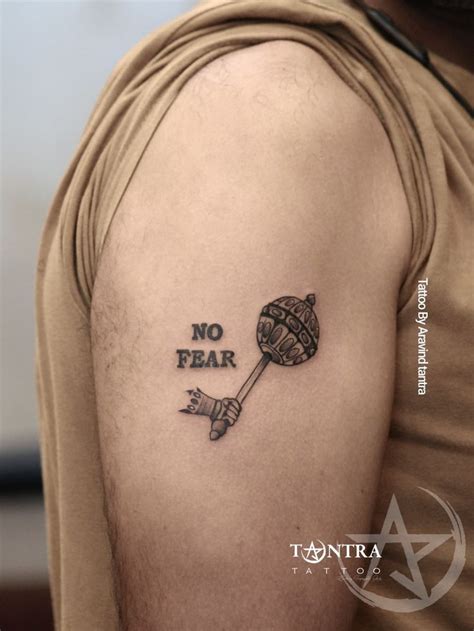 No fear tattoo design | Fear tattoo, Hanuman tattoo, Tattoo designs wrist