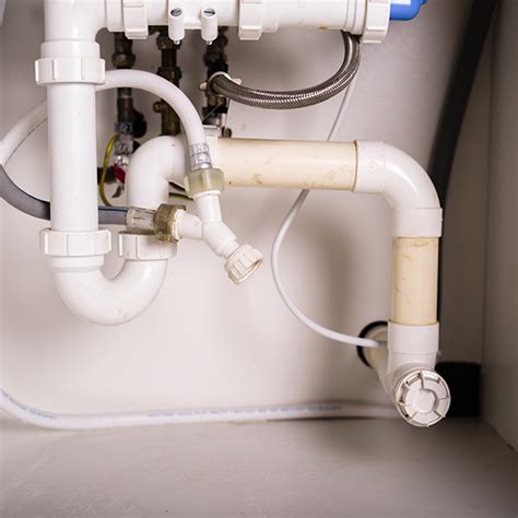 Below the Kitchen Sink: Dealing With Kitchen Drain Pipe Leaks - Water Extraction Experts