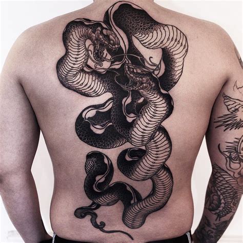 Two headed snake. Done at @the_ravens_ink with @quantumtattooinks # ...