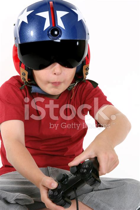 Child In Helmet Playing A Flight Simulator Stock Photo | Royalty-Free | FreeImages
