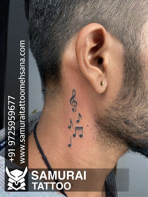 Music tattoo |Music symbol tattoo \Tattoo on neck | Small music tattoos, Music tattoos, Neck tattoo