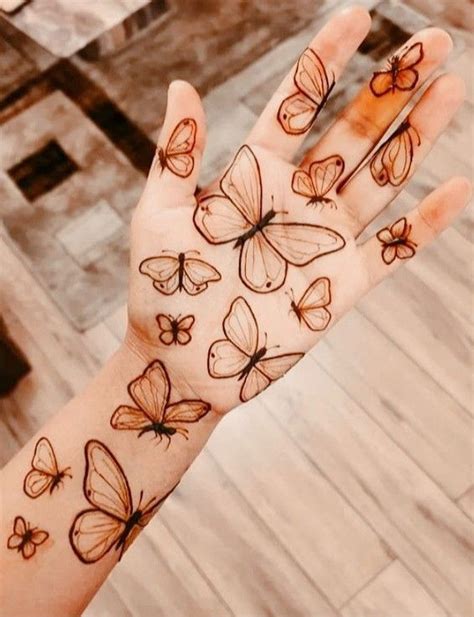 70 Minimal Henna Designs : Butterfly Henna Design on Palm I Take You ...