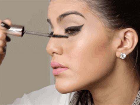 Applying Makeup Foundation GIF | GIFDB.com