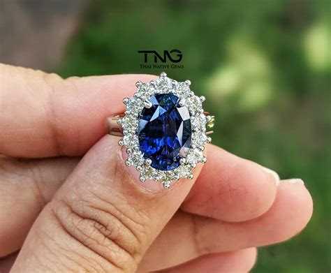 GIA 4 Carat Vivid Blue Sapphire & Diamond Platinum Engagement Ring