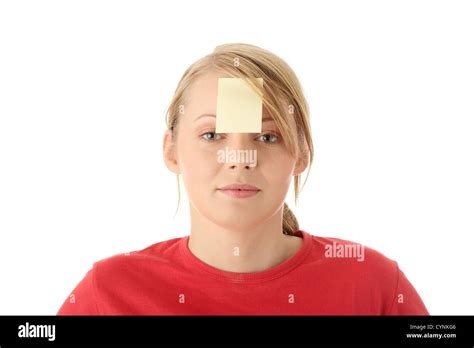 Yellow sticky note on forehead Stock Photo - Alamy