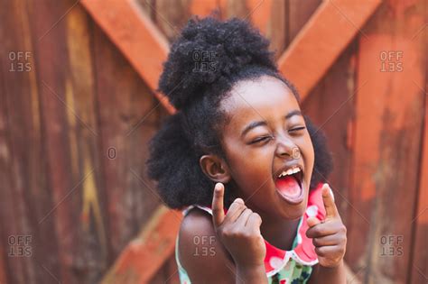 Little girl laughing - from the Offset Collection stock photo - OFFSET