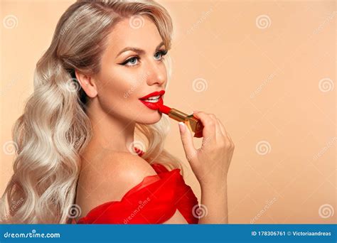 Blonde Applying Red Lipstick on Lips. Beauty Woman Makeup Stock Image ...