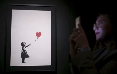 The buyer of Banksy's self-destructing painting will go through with $1.1 million sale