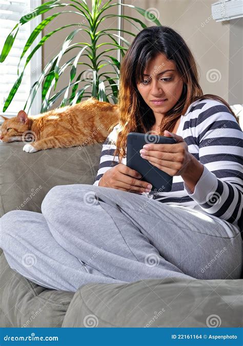 Beautiful Multiracial Woman Reading with Cat Stock Photo - Image of home, read: 22161164