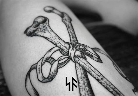 Tied bones tattoo - Tattoogrid.net