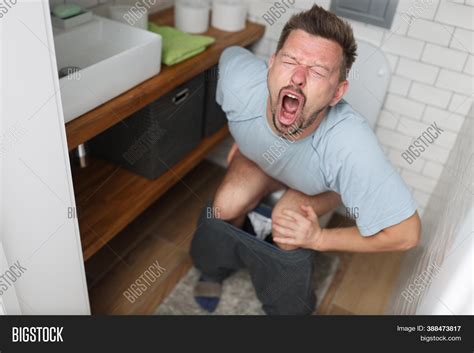 Young Man Suffering On Image & Photo (Free Trial) | Bigstock