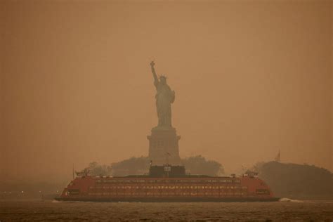 PHOTOS: Skies over Canada and U.S. darkened by hazardous wildfire haze - TrendRadars UK