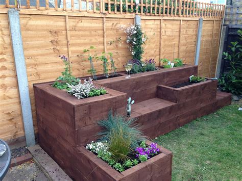 Raised flower bed | Diy raised garden, Pallets garden, Outdoor garden decor