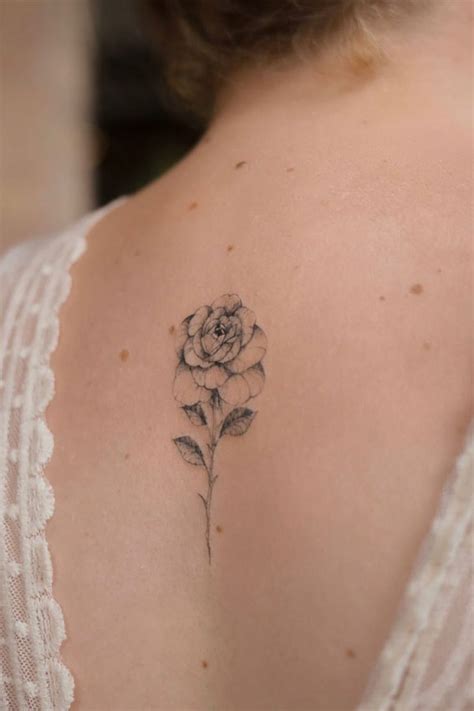 30+ Beautiful Flower Tattoo Ideas : A Beautiful Rose Tattoo on Spine I ...