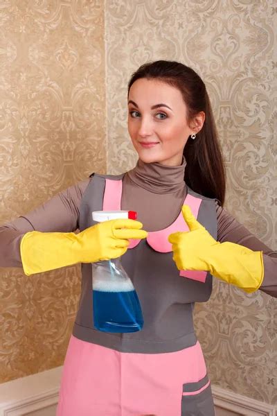 Woman in cleaning service uniform Stock Photo by ©Nomadsoul1 147450891