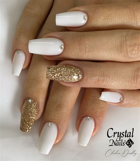 White & Gold Nails | Gold nail designs, White nails with gold, White acrylic nails with glitter