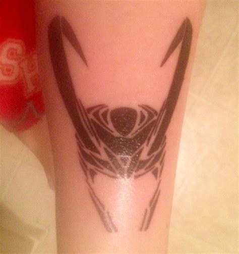 Loki's helmet tattoo | Tattoos, Helmet tattoo, Henna designs