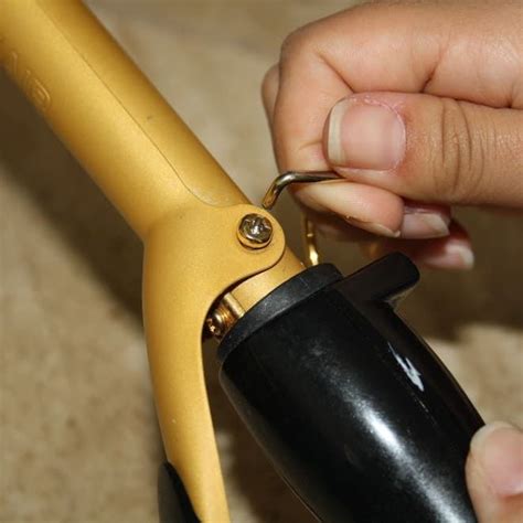 1. Remove the stand from the iron. Curling Iron Tips, Good Curling Irons, Hair Curling Tips ...