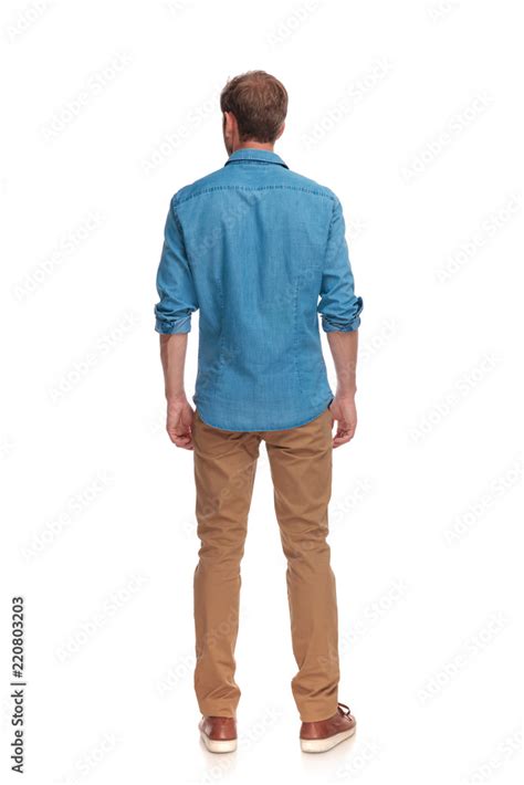 back view of a casual man standing Stock Photo | Adobe Stock