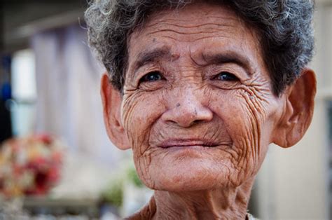 Thai Grandmother | A grandmother sitting near Wat Tri Thotsa… | Flickr