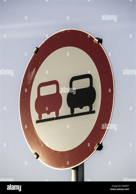 Traffic sign, do not overtake Stock Photo - Alamy