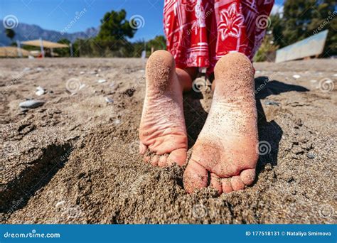 Woman or kid feet on beach stock image. Image of leisure - 177518131