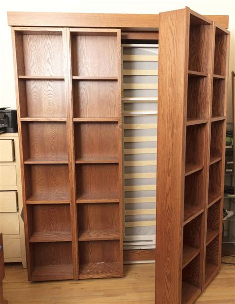 Queen Size Murphy Bed in Oak Bookcase Cabinet | EBTH