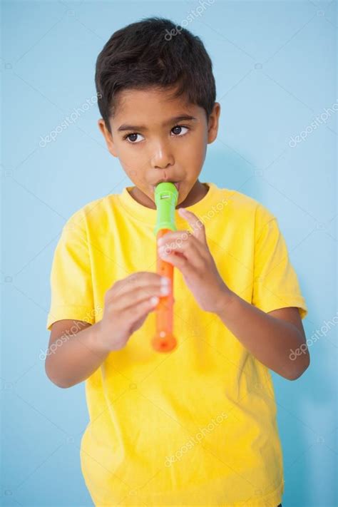 Little boy playing the recorder — Stock Photo © Wavebreakmedia #51605815