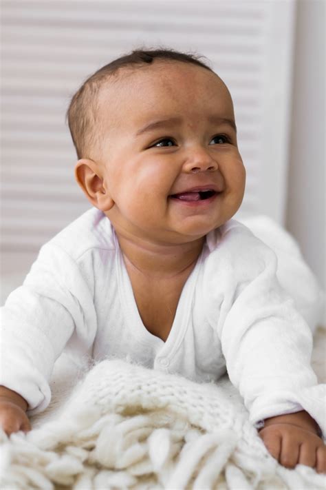 Adorable little african american baby boy laughing - Black people ...