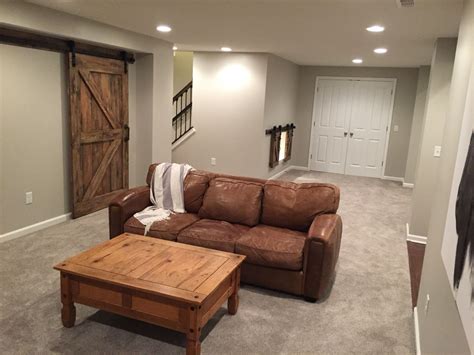 Finished basement. Walls are Agreeable Gray by Sherwin Williams. Brown ...