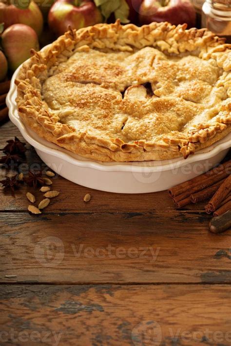 Apple pie decorated with fall leaves 15759721 Stock Photo at Vecteezy