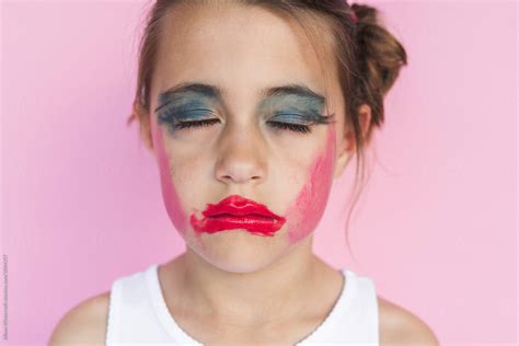 "A Seven Year Old Girl With Too Much Makeup On Her Face" by Stocksy ...