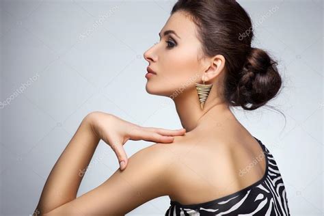 Model posing in exclusive jewelry — Stock Photo © Artwow #41583603