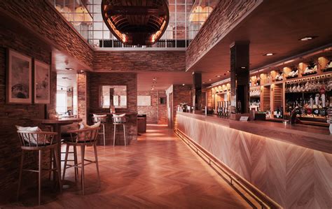 a bar with wooden floors and brick walls