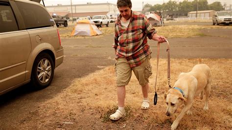 Wildfire Evacuation: Evacuees at Oregon fairgrounds ask for help