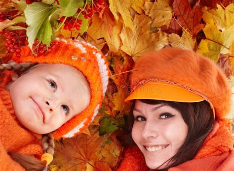 Happy Family with Child on Autumn Orange Leaf. Stock Photo - Image of ...