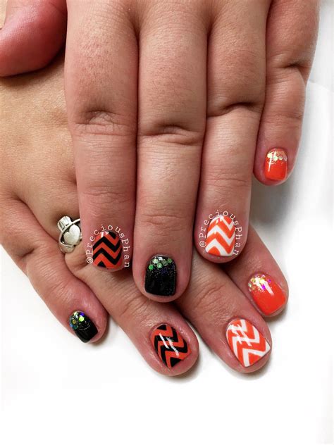 Make A Style Statement With Black And Orange Halloween Nails – The FSHN