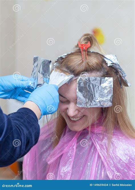 Hairdresser in a Hair Dyeing Process Stock Photo - Image of beautiful ...